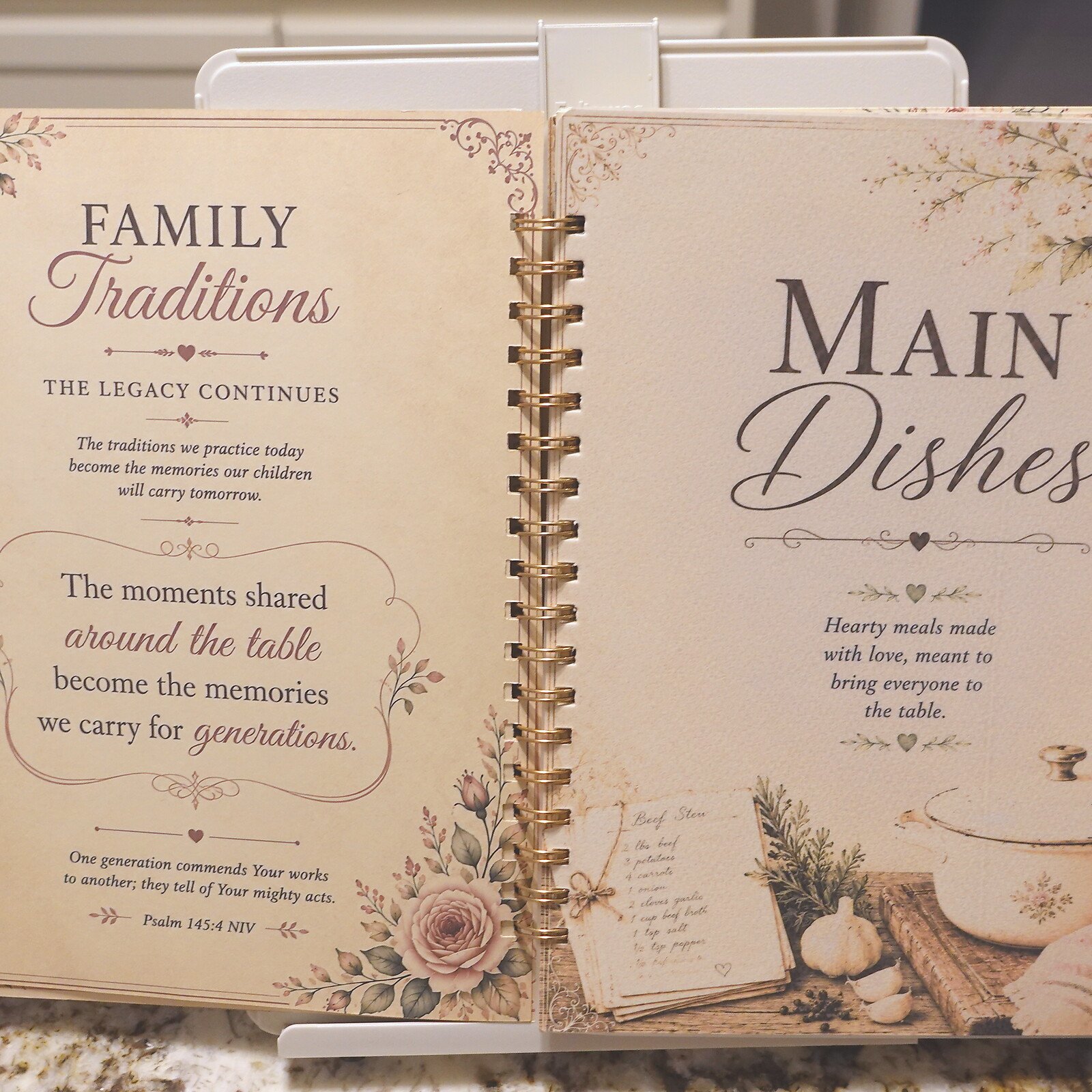 09-open-main-dishes-divider - Simple Living Faith Open decorative recipe scrapbook showing 'Family Traditions' on the left page and 'Main Dishes' on the right, with floral borders and a spiral binding in the center.
